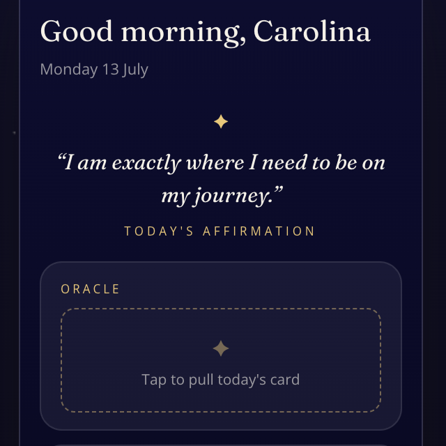 A dark navy mobile app interface showing a morning affirmation card for Monday, 13 July, with the text 'Good morning, Carolina' and 'I am exactly where I need to be on my journey.' Below is a card labeled Oracle with a placeholder message, and another card labeled Moon Cycle indicating Full Moon with a yellow moon icon.